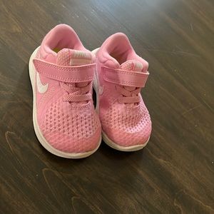 Baby pink Nike sneakers